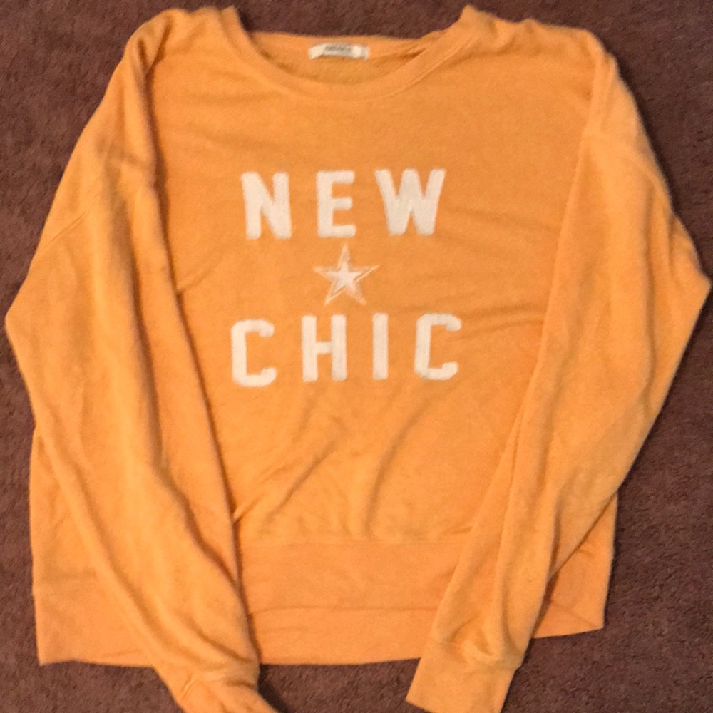 Yellow / orange shirt